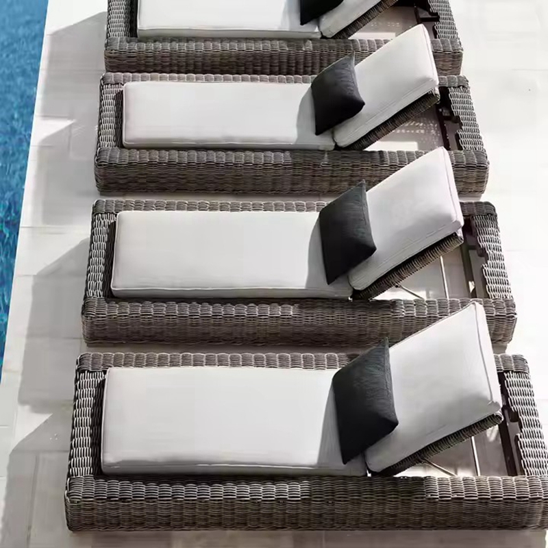 rattan lounger.jpg